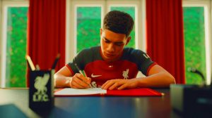 Illustration de Florian Wirtz en train de signer son contrat avec Liverpool. Image réalisée par IA.